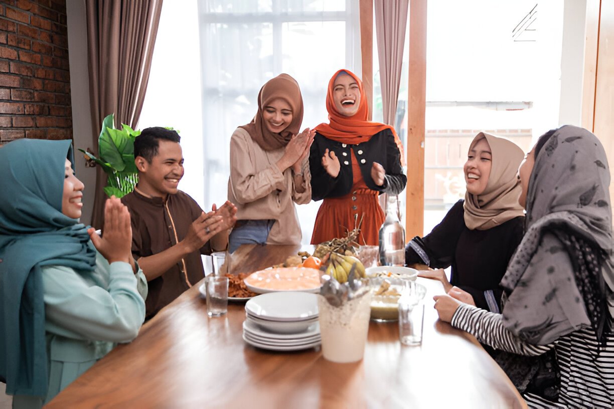 A happy Islamic family celebrating in their newly purchased home in Fremont, California, as first-time home buyers.